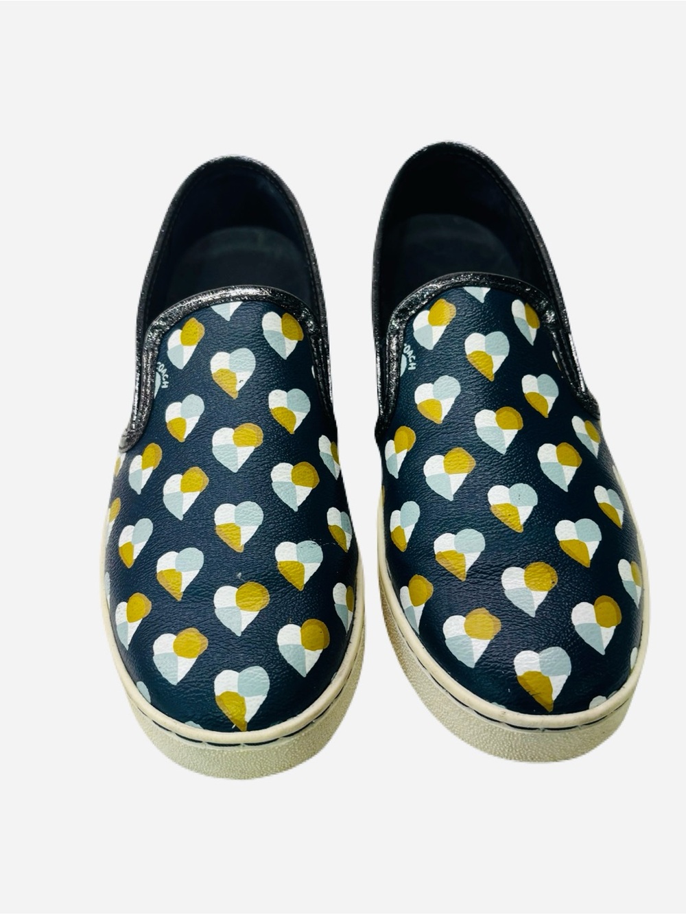 COACH C117 midnight navy slip-on sneakers with gold & white heart pattern